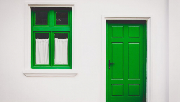 unique green door and window